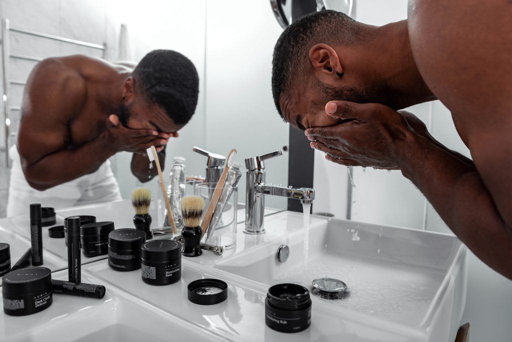 man-washing-his-face